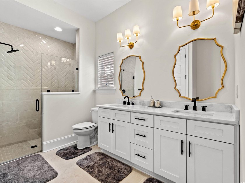 Located in the gated Ocean Villas at 67th community, home to - photo 17