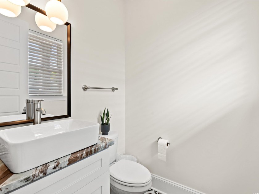 Located in the gated Ocean Villas at 67th community, home to - photo 18