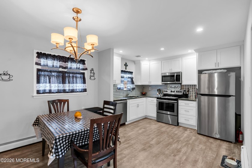Welcome to this warm and inviting 2-bedroom, 1-bath home in the - photo 11