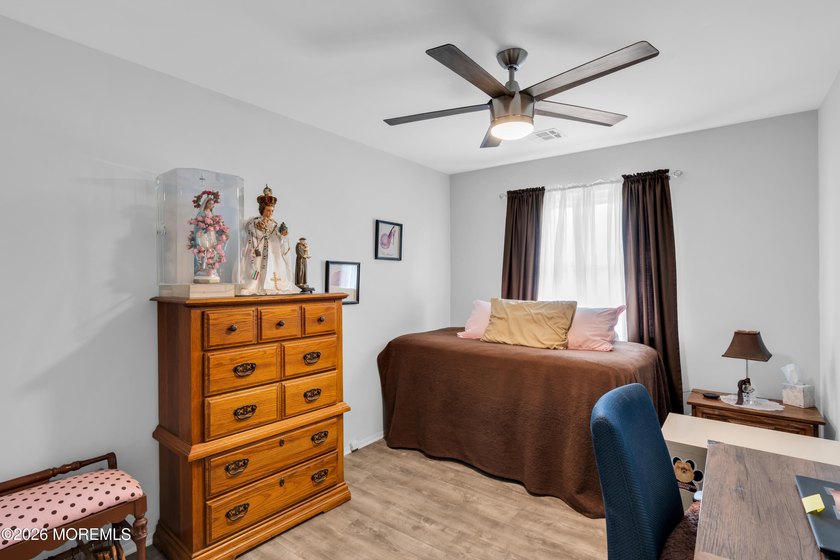 Welcome to this warm and inviting 2-bedroom, 1-bath home in the - photo 17