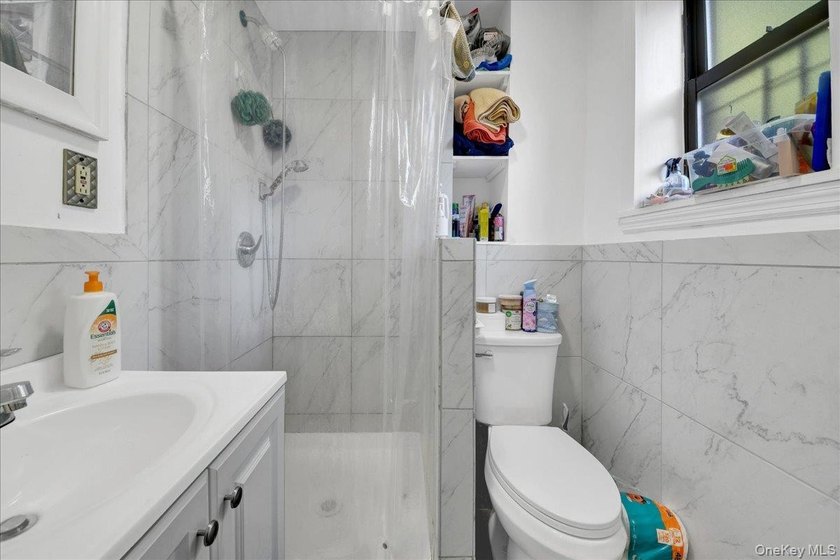 Well-maintained Bronx home offering spacious living, generous - photo 9