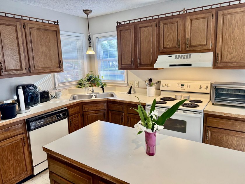 Welcome to your new coastal oasis at 4840 Moss Creek Loop #8 in - photo 5