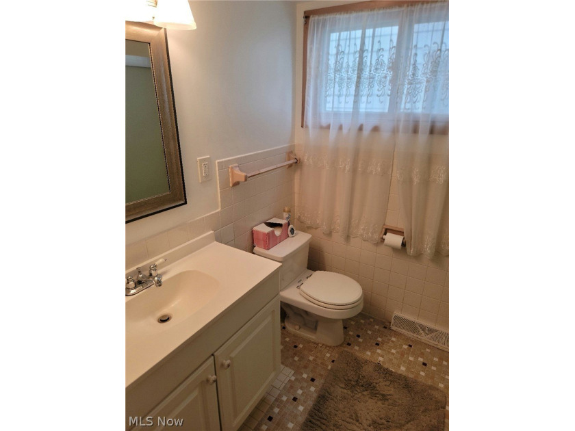 Charming Euclid Brick Duplex. The property at 535-537 E 208th St - photo 14