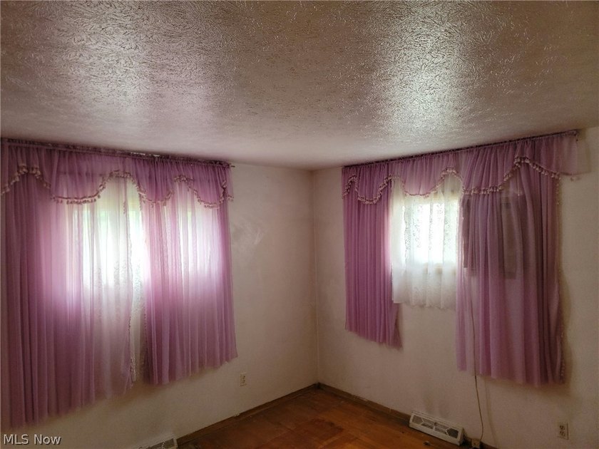 Charming Euclid Brick Duplex. The property at 535-537 E 208th St - photo 16