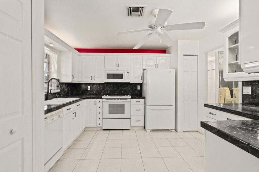 Aggressively priced end-unit waterfront condo offering serene - photo 10
