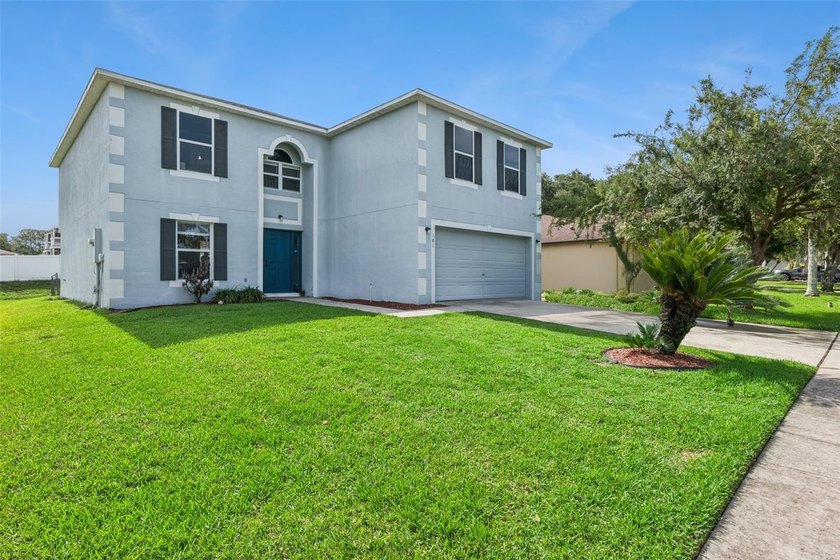 Virtually Staged. Experience elevated living in the gated - photo 5