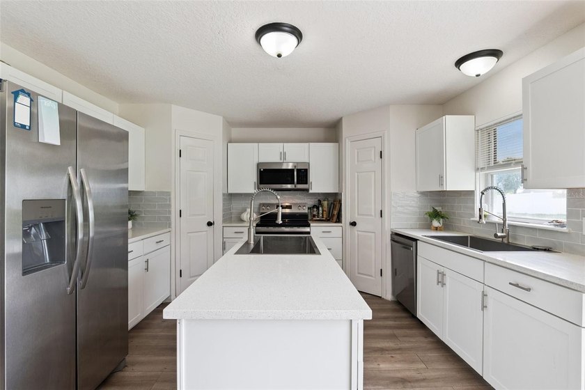 Virtually Staged. Experience elevated living in the gated - photo 10