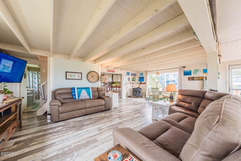 Mid-town beauty with large decks and ocean and surf views from - photo 16