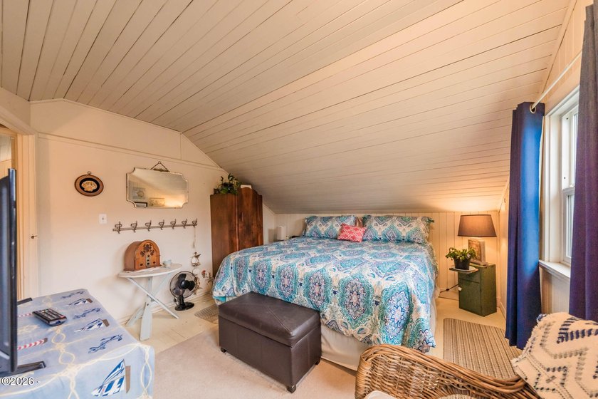 Mid-town beauty with large decks and ocean and surf views from - photo 28