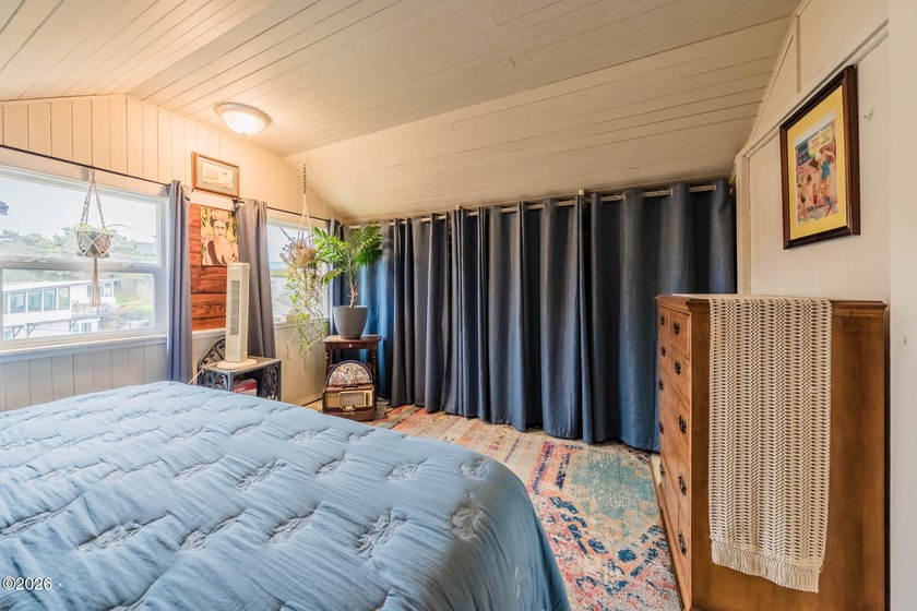 Mid-town beauty with large decks and ocean and surf views from - photo 32