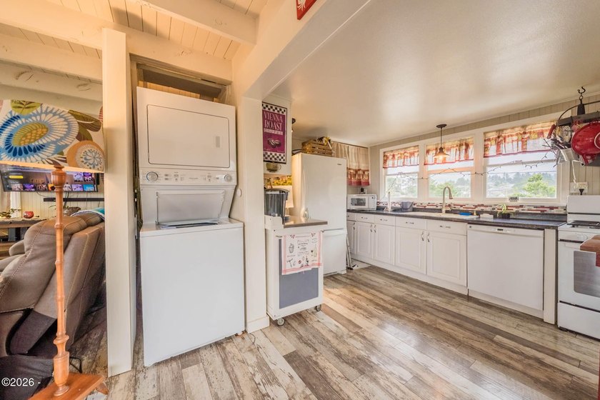 Mid-town beauty with large decks and ocean and surf views from - photo 35