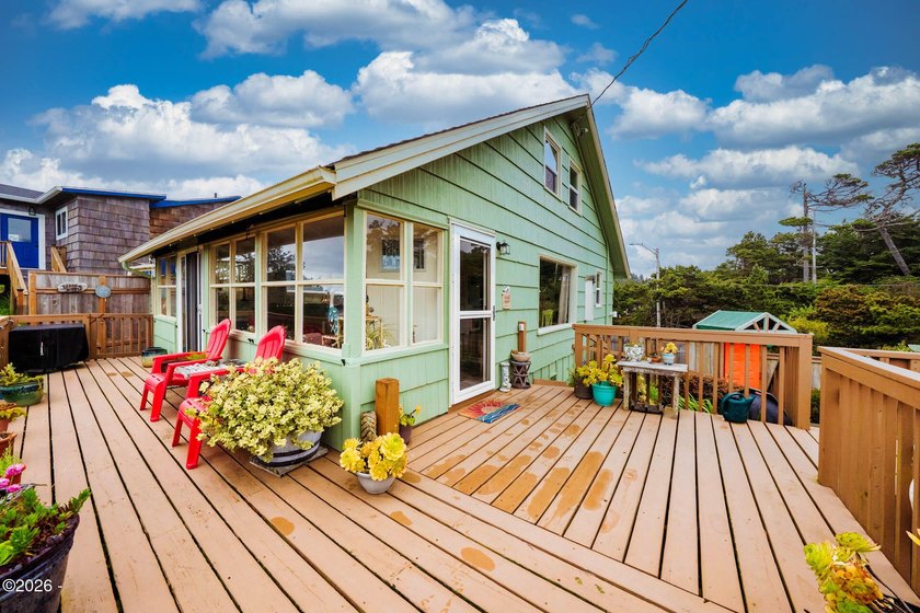Mid-town beauty with large decks and ocean and surf views from - photo 38