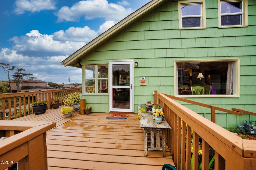 Mid-town beauty with large decks and ocean and surf views from - photo 40