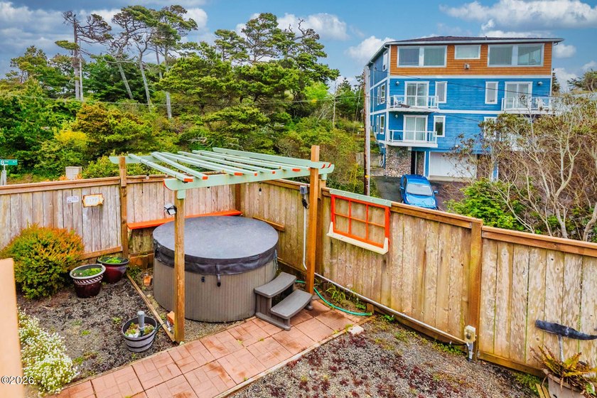 Mid-town beauty with large decks and ocean and surf views from - photo 44