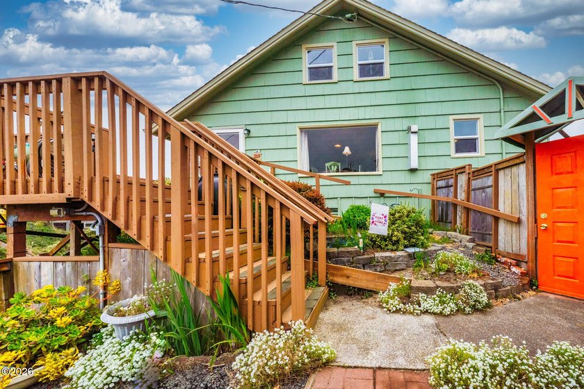 Mid-town beauty with large decks and ocean and surf views from - photo 47