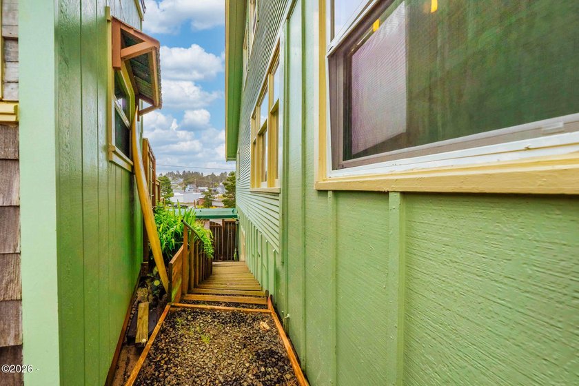 Mid-town beauty with large decks and ocean and surf views from - photo 50