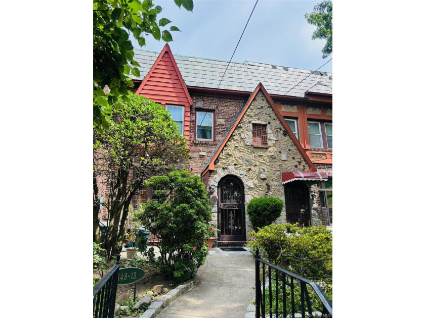 Classic 3-bedroom, 2-bath attached Tudor in the heart of - photo 2