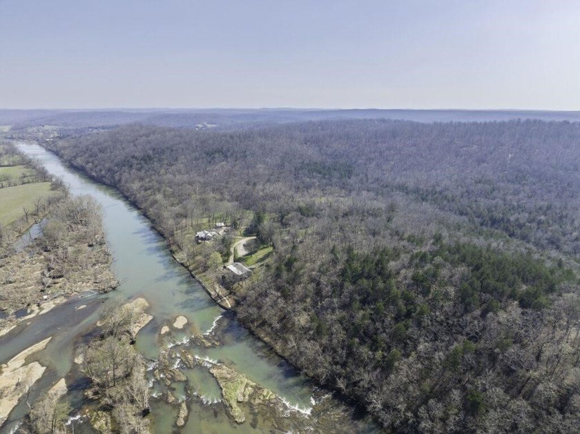 262+/- acre &amp; country home for sale with long frontage on the - photo 35