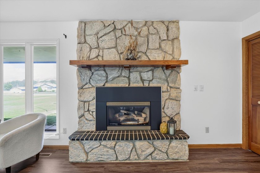 All-brick home offering space and comfort throughout! Features a - photo 11