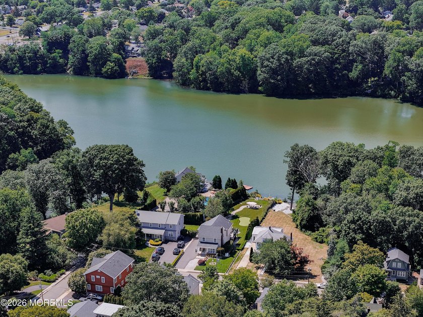 The finest lakefront property on the scenic Lake Lefferts in - photo 13