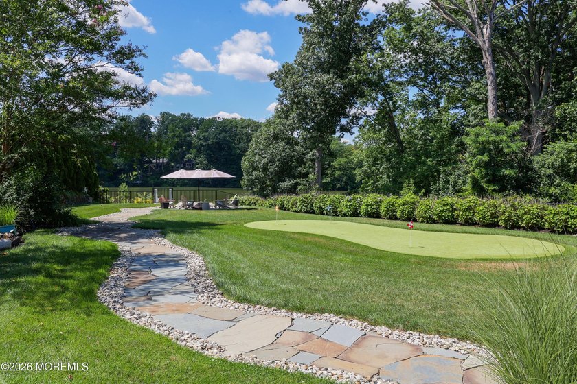 The finest lakefront property on the scenic Lake Lefferts in - photo 14