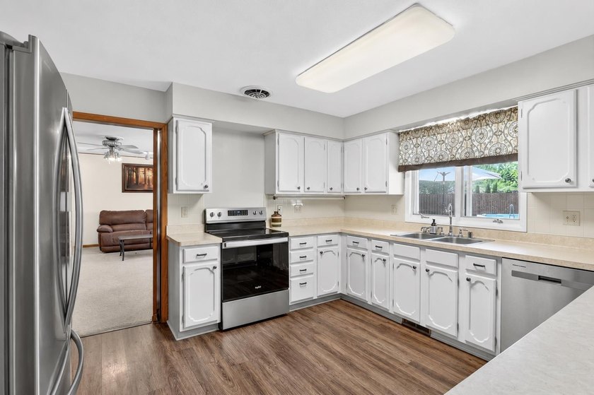 All-brick home offering space and comfort throughout! Features a - photo 16