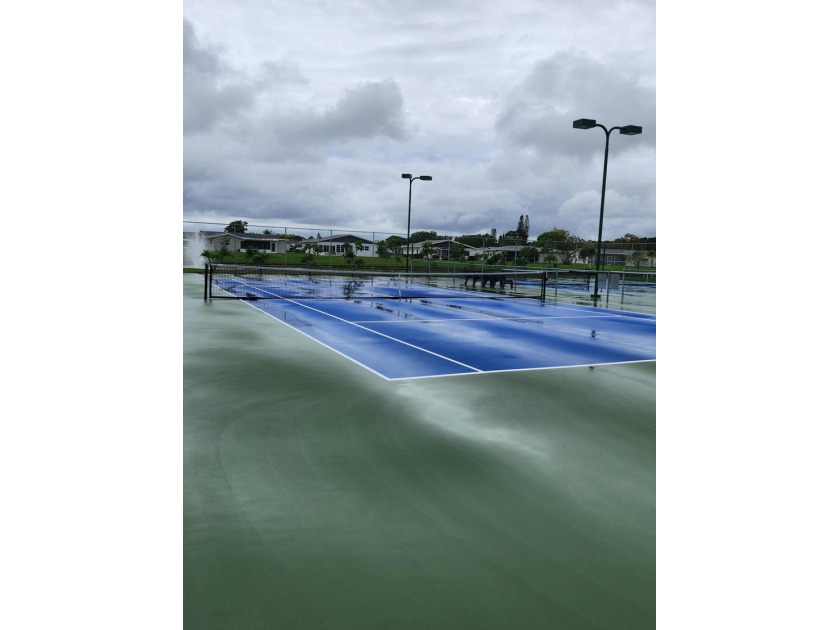 Welcome to the Cypress Lakes Active 55+ community, where you can - photo 17