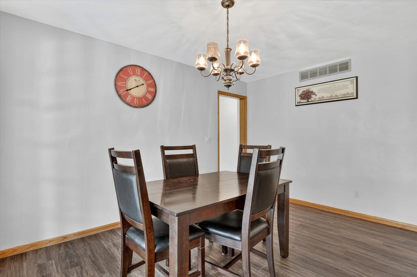 All-brick home offering space and comfort throughout! Features a - photo 18