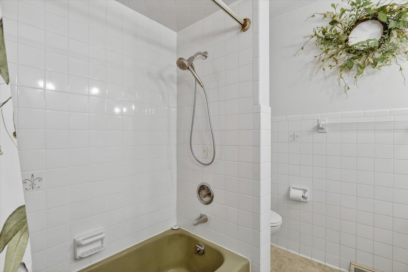 All-brick home offering space and comfort throughout! Features a - photo 22