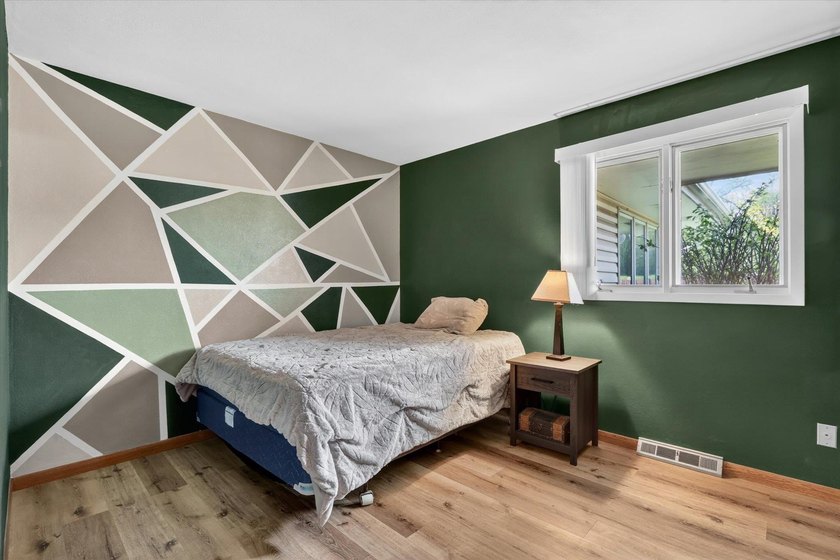 All-brick home offering space and comfort throughout! Features a - photo 23
