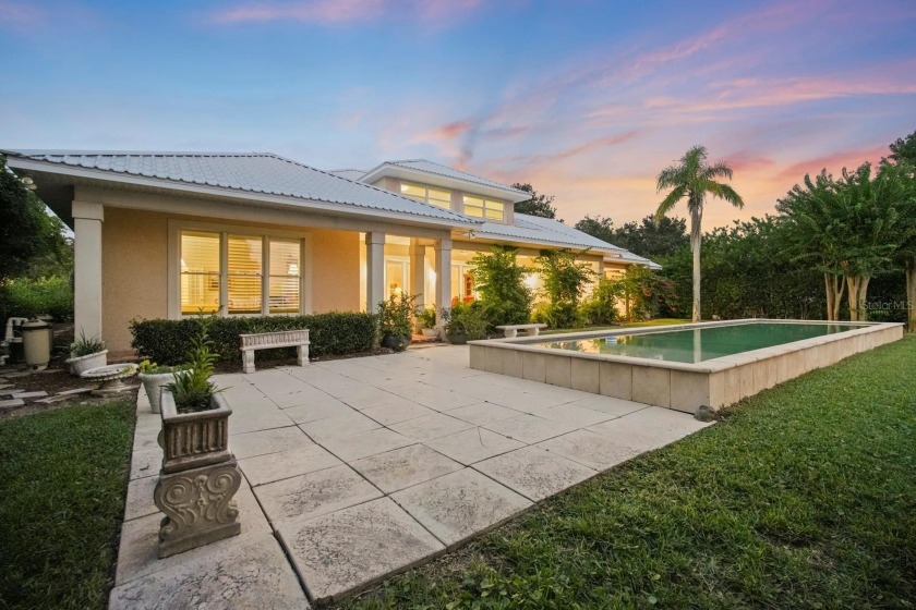 Experience luxurious riverfront living in this striking - photo 7