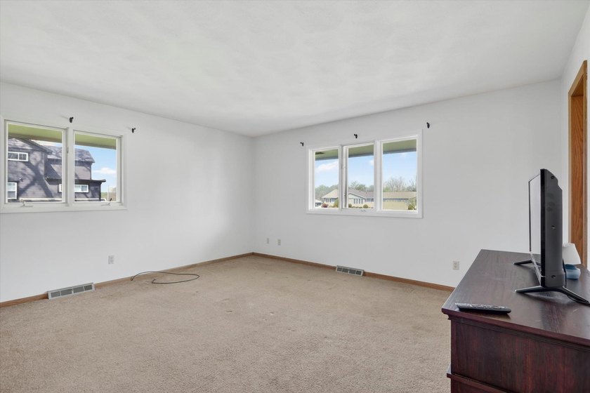 All-brick home offering space and comfort throughout! Features a - photo 27