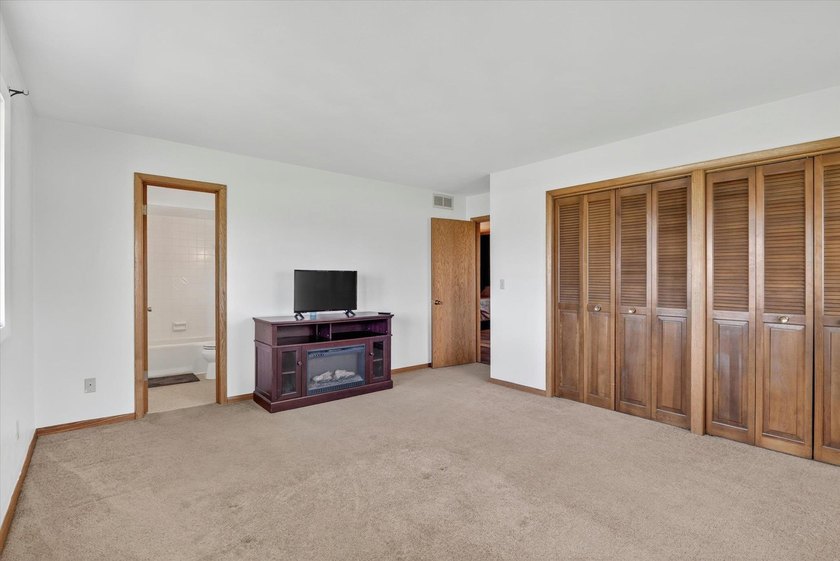 All-brick home offering space and comfort throughout! Features a - photo 28