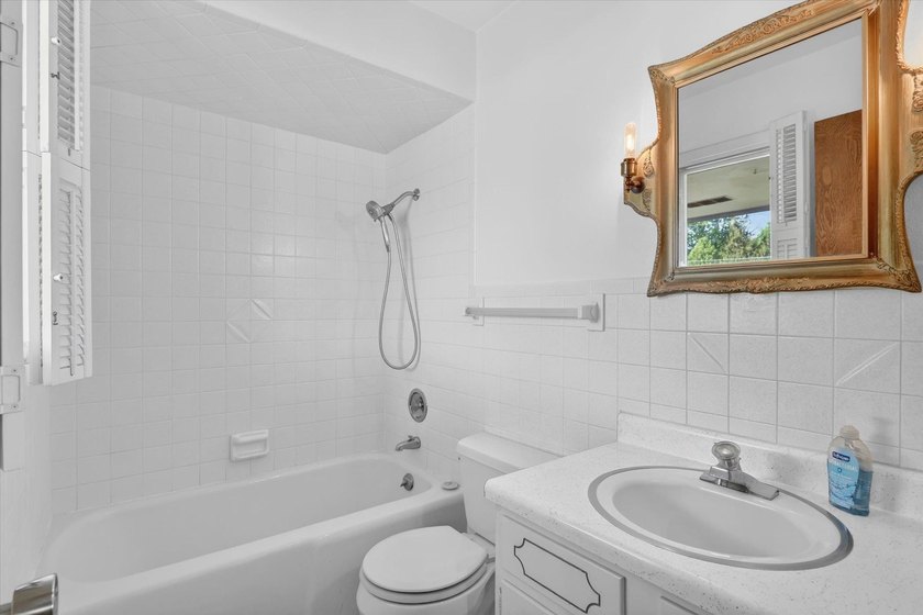All-brick home offering space and comfort throughout! Features a - photo 29