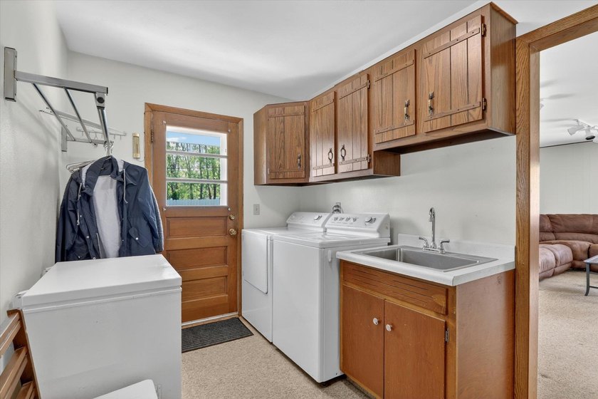 All-brick home offering space and comfort throughout! Features a - photo 47