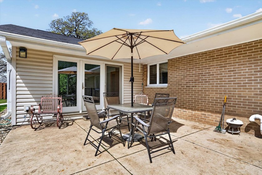 All-brick home offering space and comfort throughout! Features a - photo 49
