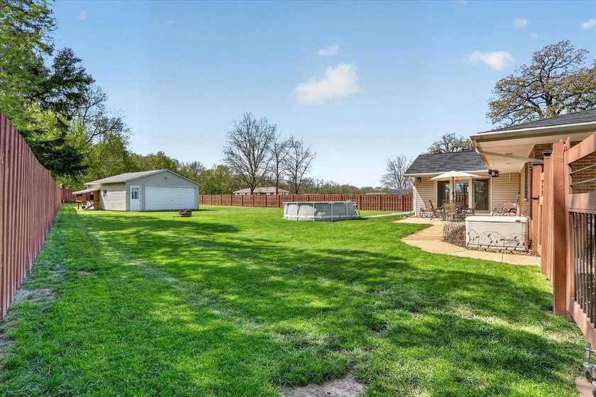 All-brick home offering space and comfort throughout! Features a - photo 50