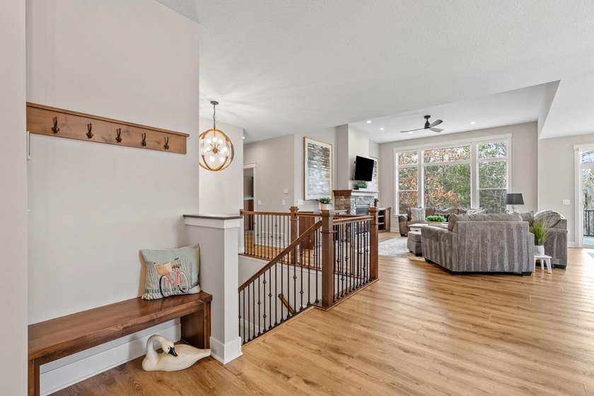 Luxury, low-maintenance living meets peaceful wooded privacy in - photo 6