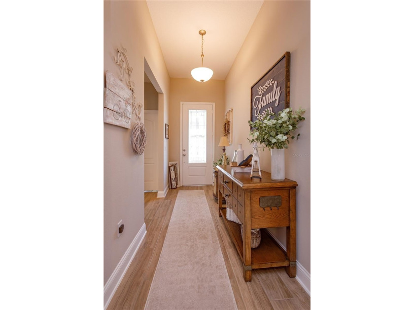 LOCATED IN THE HIGHLY SOUGHT AFTER GOLF CART DISTRICT OF - photo 4
