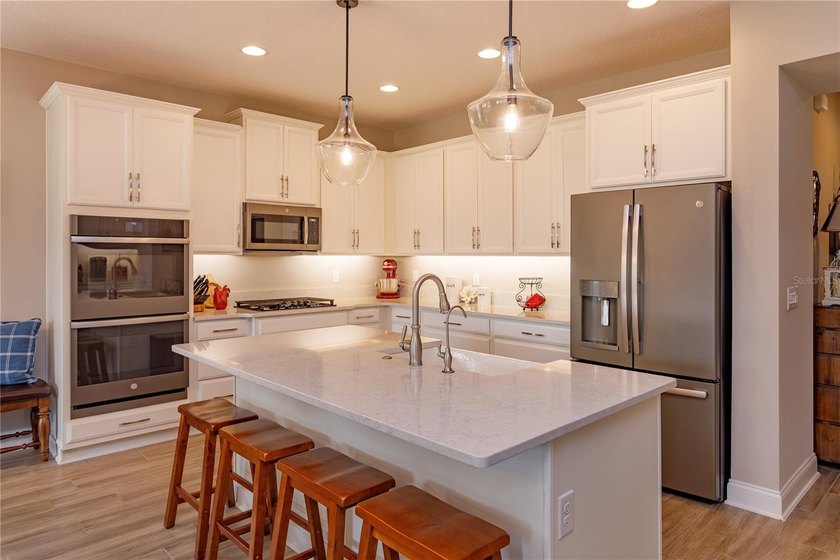 LOCATED IN THE HIGHLY SOUGHT AFTER GOLF CART DISTRICT OF - photo 6