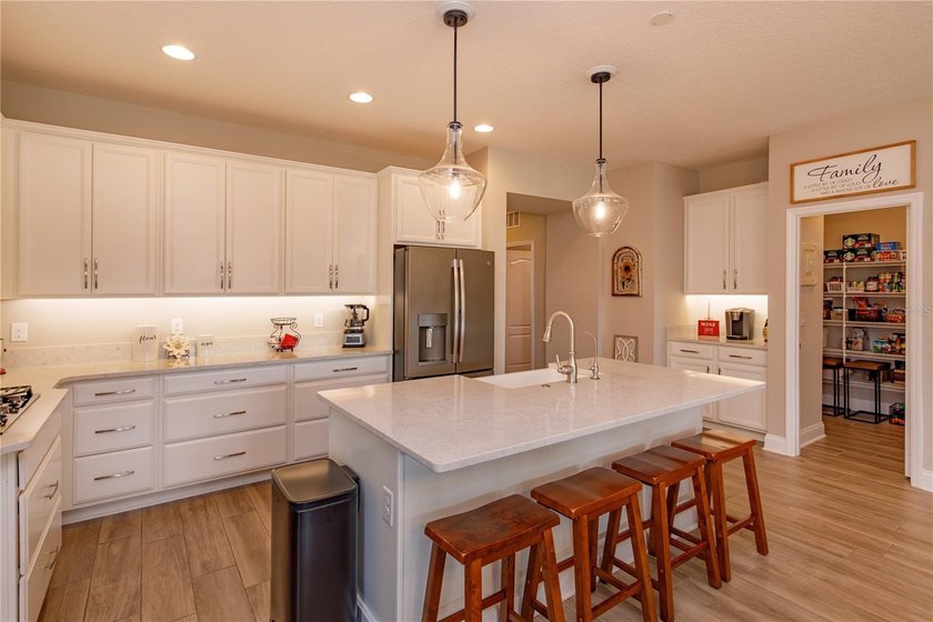 LOCATED IN THE HIGHLY SOUGHT AFTER GOLF CART DISTRICT OF - photo 7
