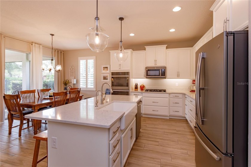 LOCATED IN THE HIGHLY SOUGHT AFTER GOLF CART DISTRICT OF - photo 8