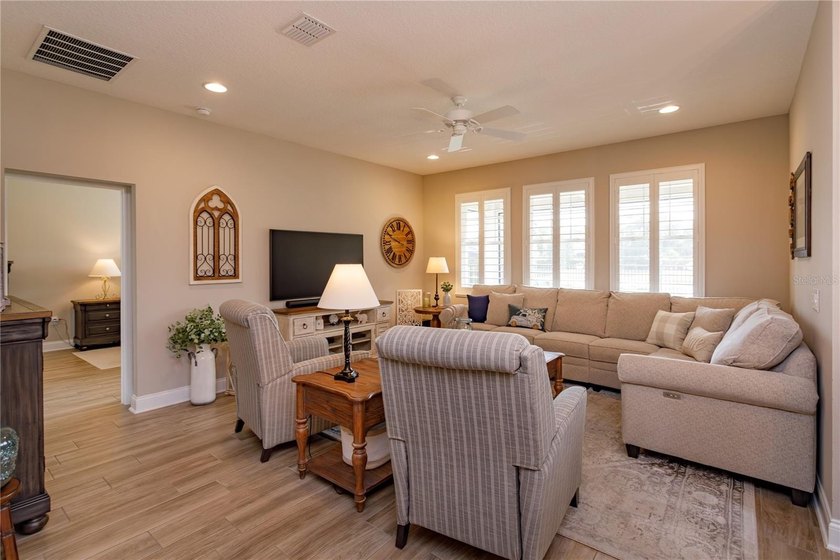 LOCATED IN THE HIGHLY SOUGHT AFTER GOLF CART DISTRICT OF - photo 10
