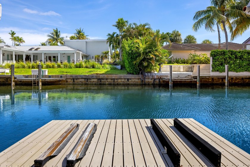 Tucked within the prestigious enclave of Boca Bay Colony, this - photo 20