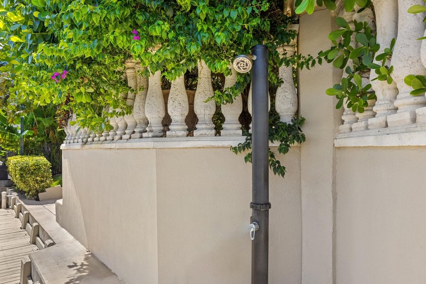 Tucked within the prestigious enclave of Boca Bay Colony, this - photo 21