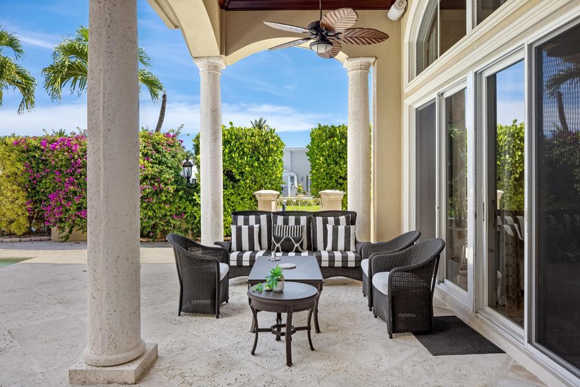 Tucked within the prestigious enclave of Boca Bay Colony, this - photo 22
