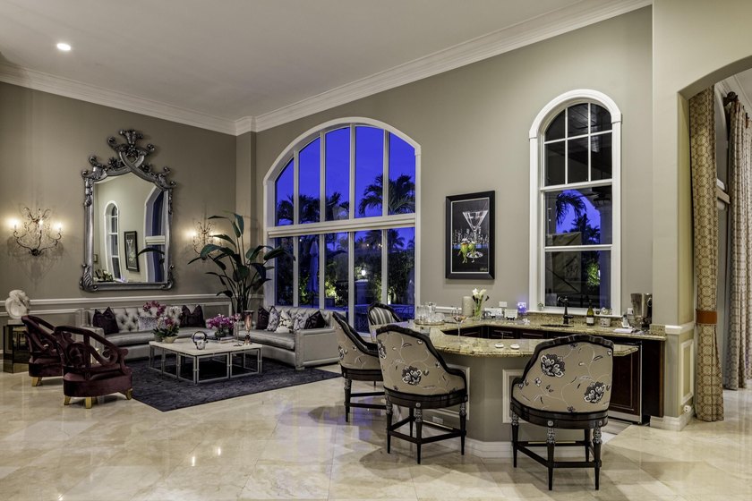 Tucked within the prestigious enclave of Boca Bay Colony, this - photo 27