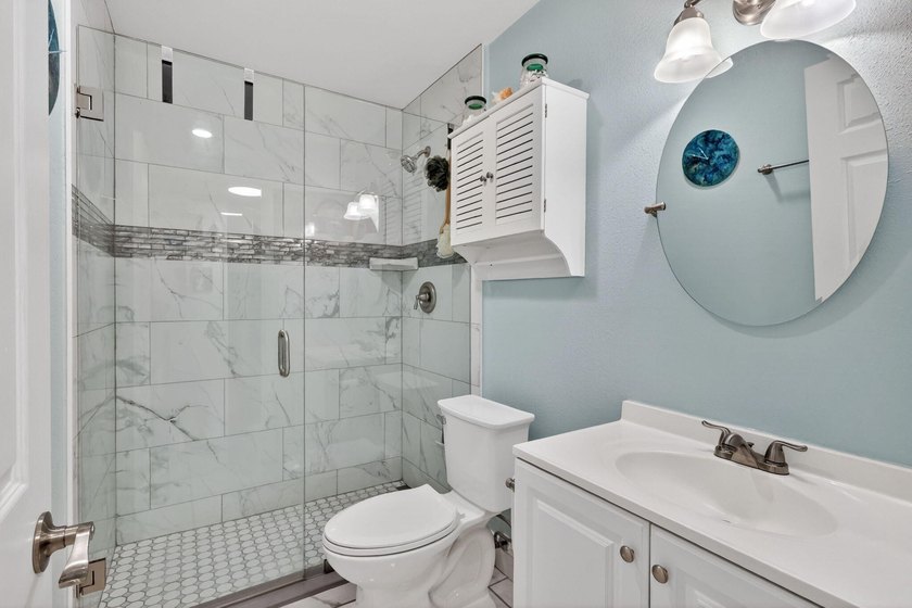 This beautifully updated 2 bedroom, 1 bath condo offers the - photo 16