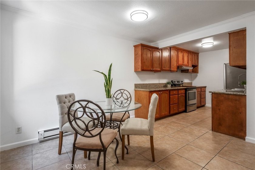 This RARE affordable corner townhome unit nestled in Miraleste - photo 6