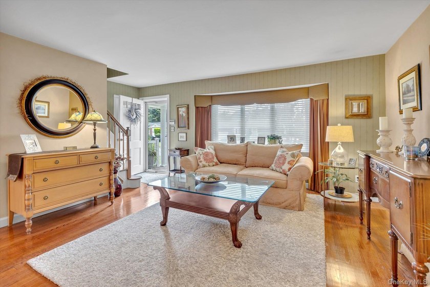 Welcome to this beautifully updated 4-bedroom, 2-bath Cape that - photo 3